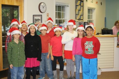 The 4th graders performed a clogging routine at the Library Cookie Swap. Clogging is the official state dance of North Carolina. 